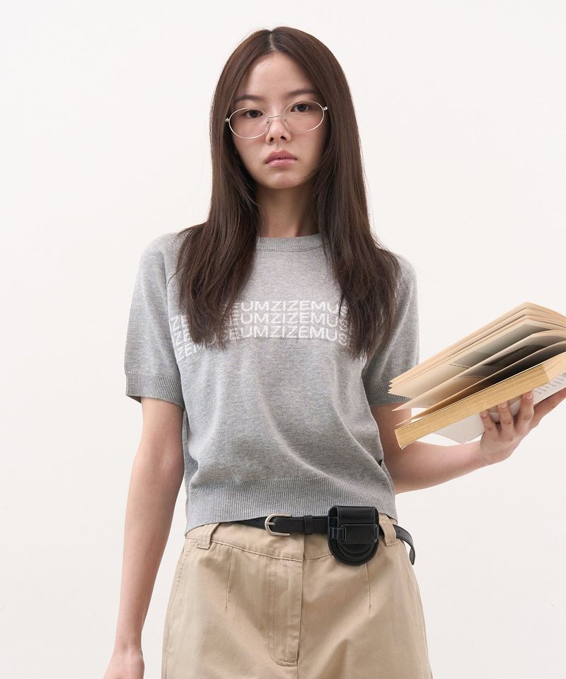 ZIZEMUSEUM（ジゼミュージアム）の「ZIZE LOGO HALF KNIT (GRAY)（Tops）」