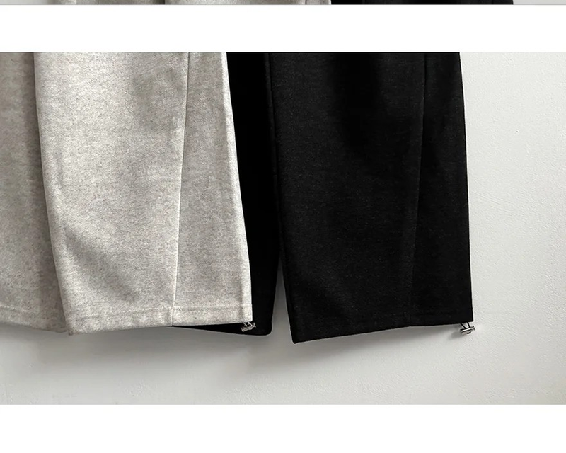 Mende Curved Incision Woolen Wide Pants