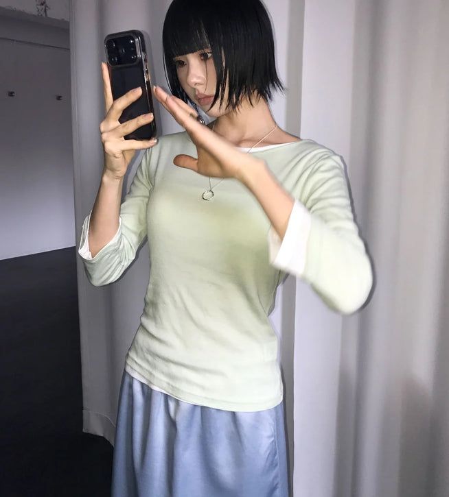 AAKE(アケ)の「TENCEL LAYERED 3/4 TEE(Tops)」