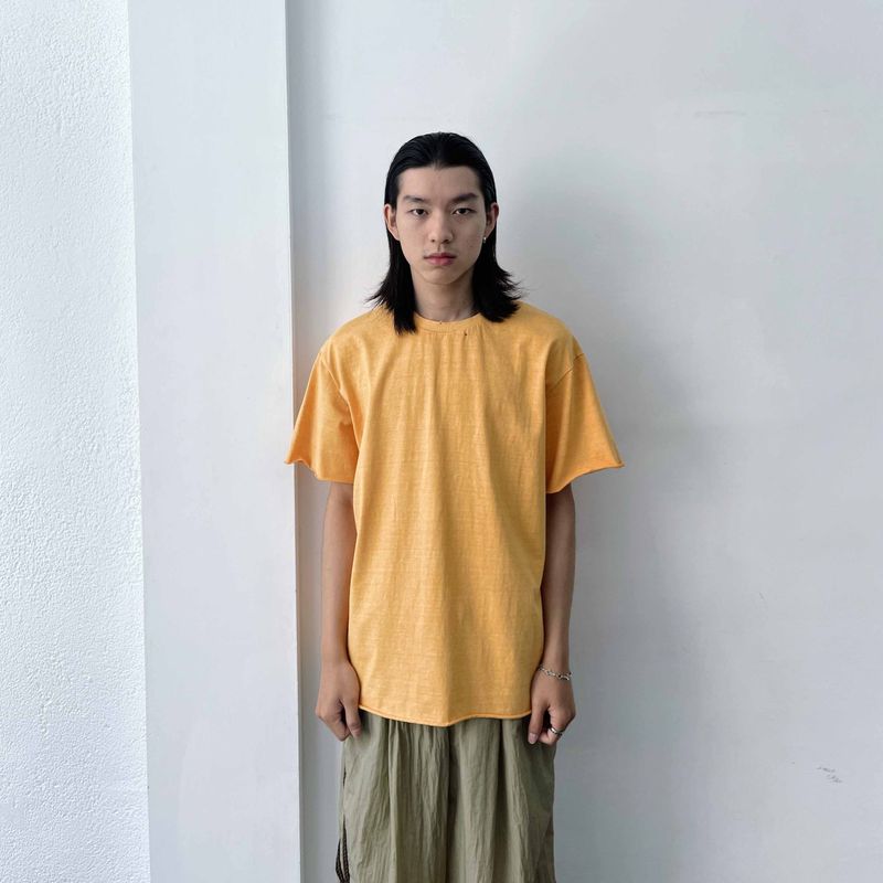 FADE MEET（フェードミート）の「Sunlit Orange Relaxed Tee（Tops）」