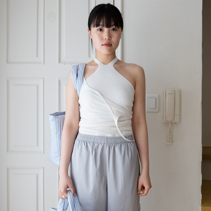 shytimothee（シャイティモシー）の「stripe padded bag - blue（Bags）」
