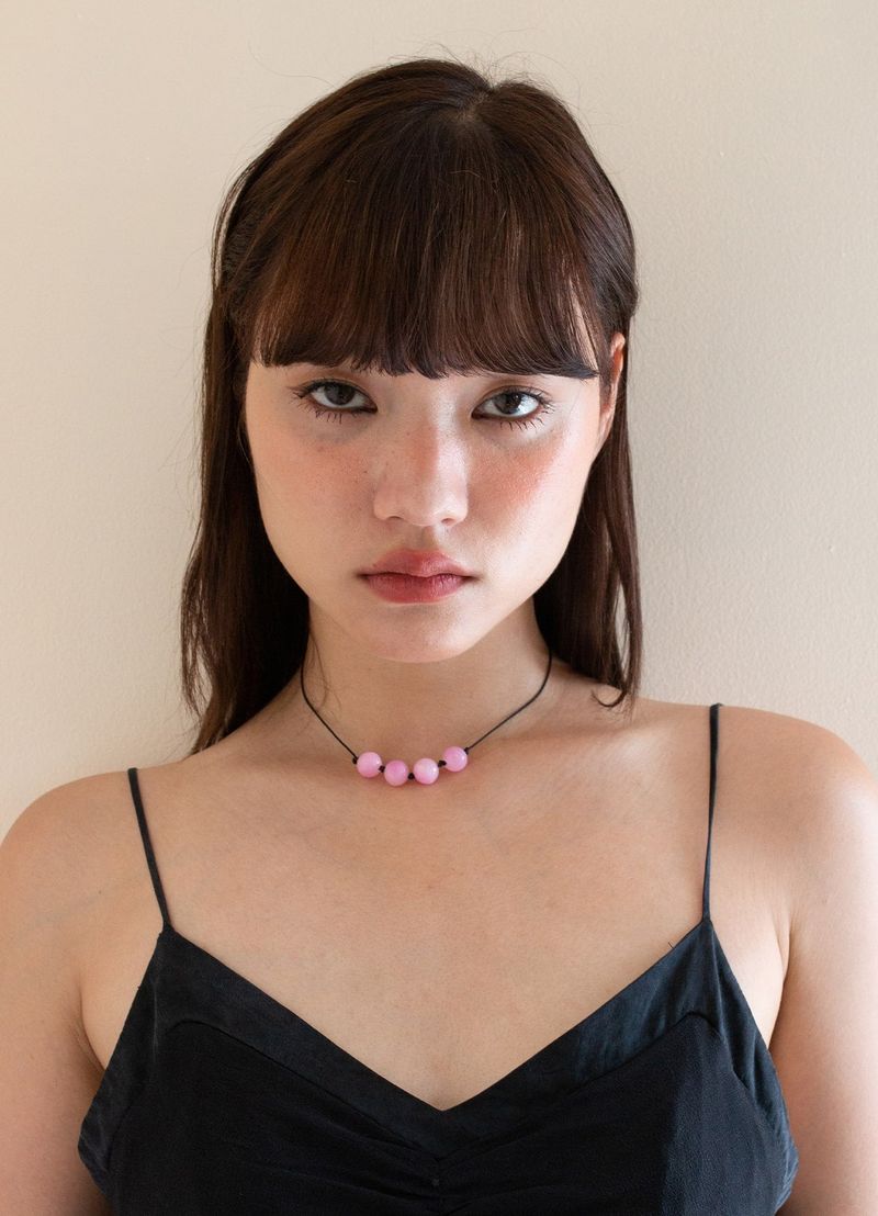 YAHN SISI（ヤーン シシ）の「Bubble Necklace - Pink（Accessories）」