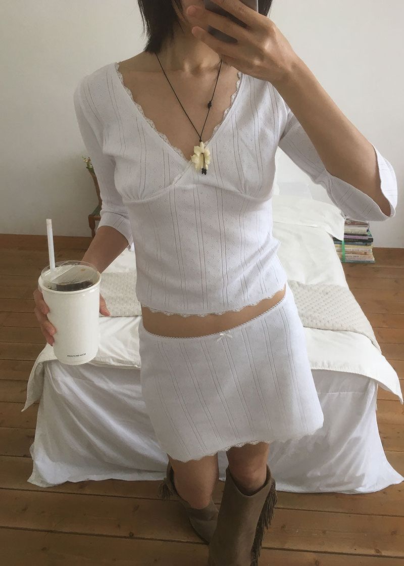 PINTER PUNCHING MINI SKIRT (2color)