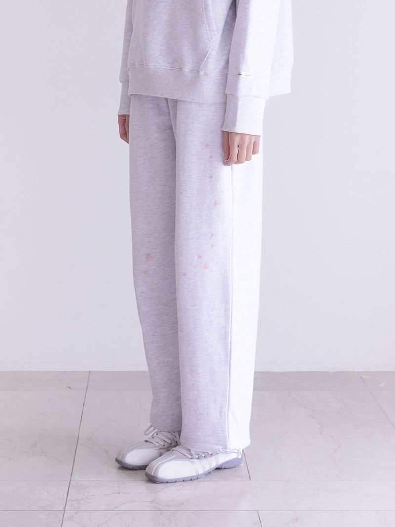 Innermuseum（インナーミュージアム）の「star embroidered two-way sweatpants (W-MELANGE)（Pants）」
