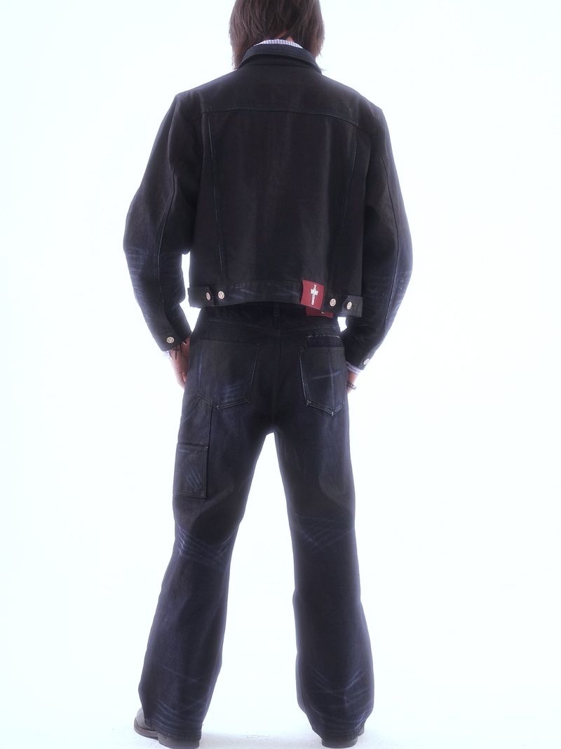 COATED KNIFE-SCRAPED HAND-WIPED DISTRESSED BOOTCUT JEANS