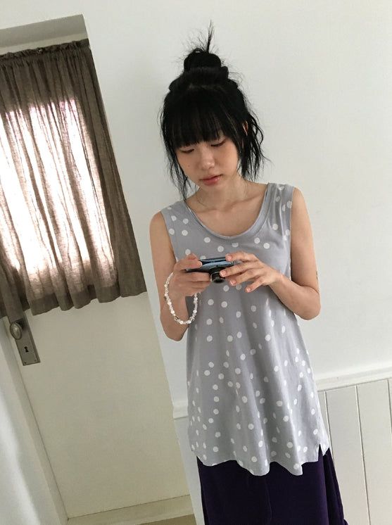 BAON（バオン）の「オシオン サイドスリット ツイスト ドット レイヤード スリーブレス（トップス）」