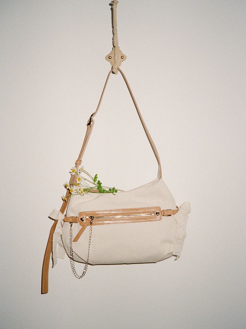 ovuni(オーブニ)の「Belted ribbon bag_canvas caramel(Bags)」