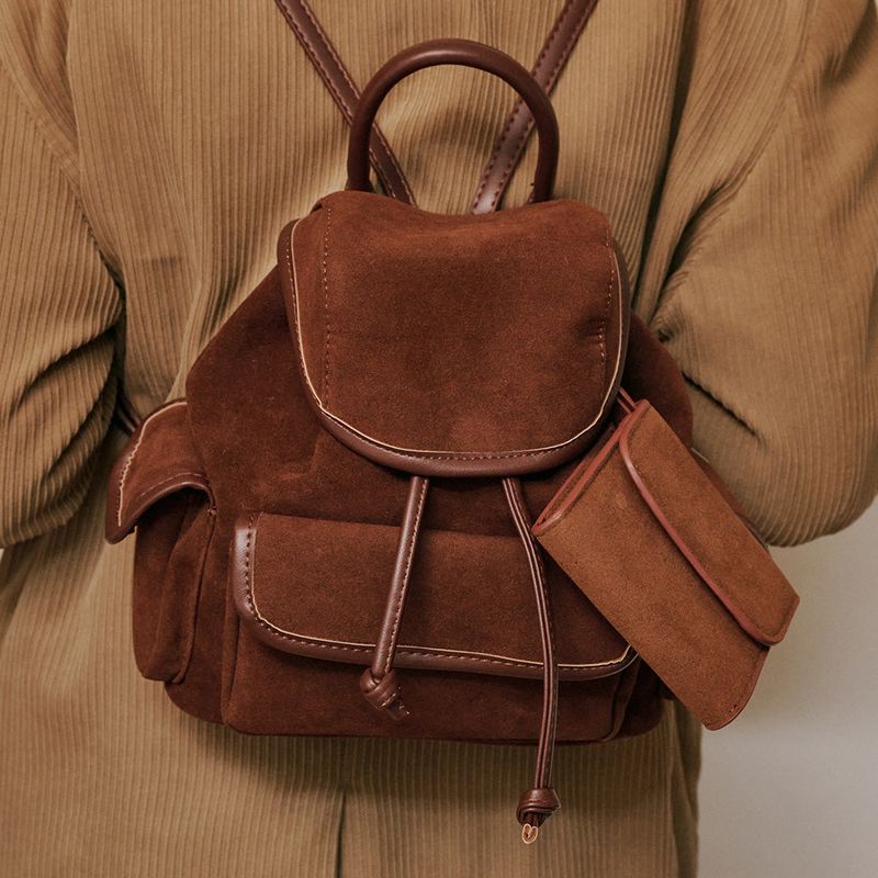 ALLINCOMPLETE（オールインコンプリート）の「Nube Suede Mini Backpack (Brown)（Bags）」