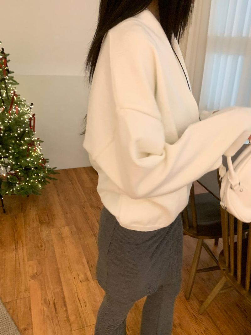 Melli Loose-Fit Wrap V-Neck Hidden Snap Knit Top