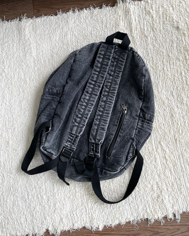Washed denim backpack