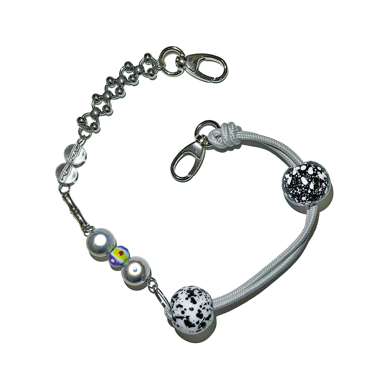 Pierced ball bag chain