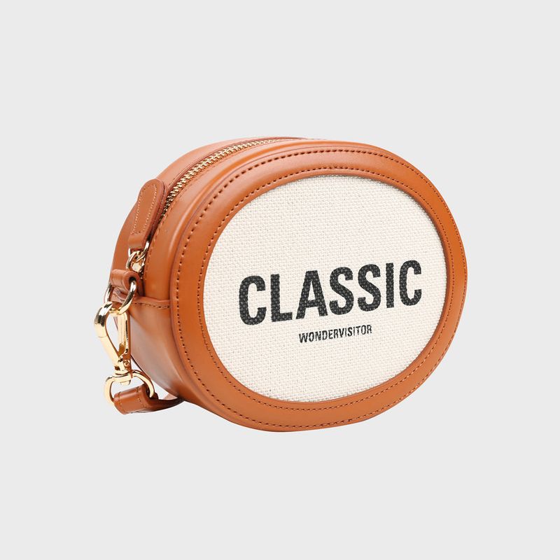 wonder visitor（ワンダービジター）の「Classic oval mini cross bag [Brown]（Bags）」