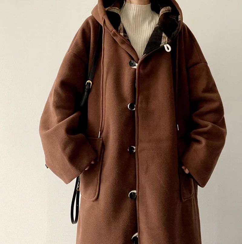 Melty King Bakshi woolen pocket long hooded coat