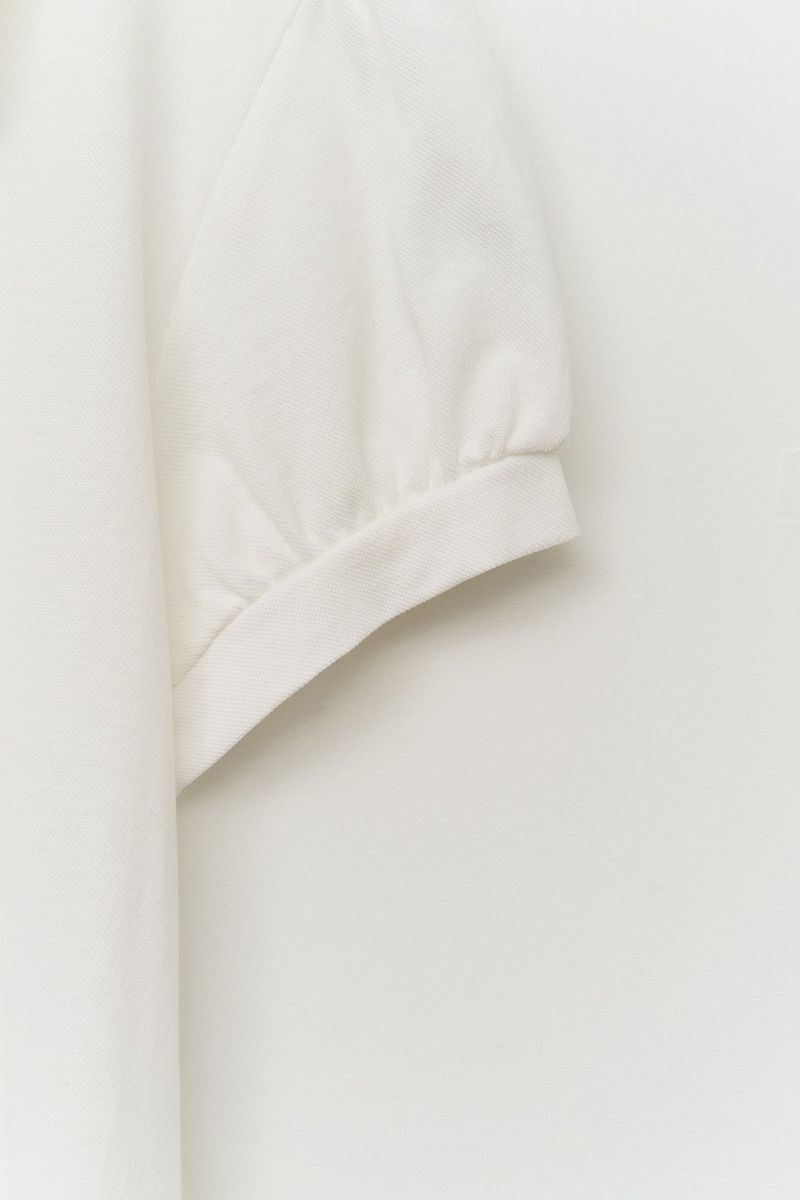 (W) Eke Unbalance Top