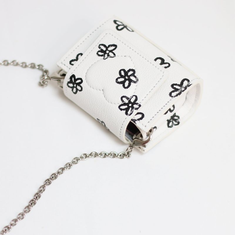 shape of' microbag - black flowers