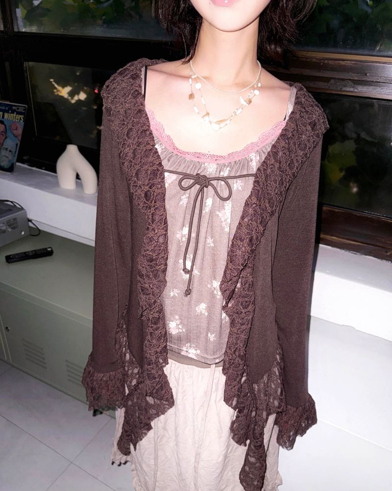 douchidouchi（ドウチドウチ）の「(2color) Ruffle Lace Soft Cardigan（Tops）」
