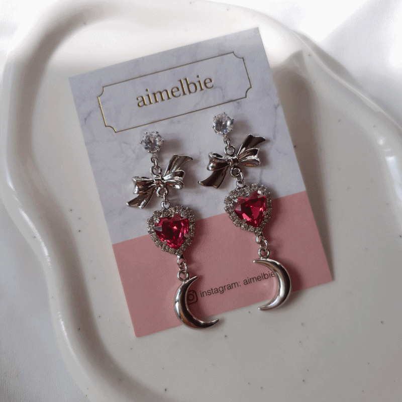 aimelbie（アイメルビー）の「ムーンウィッチイアリング- ローズピンク/シルバー（アクセサリー）」