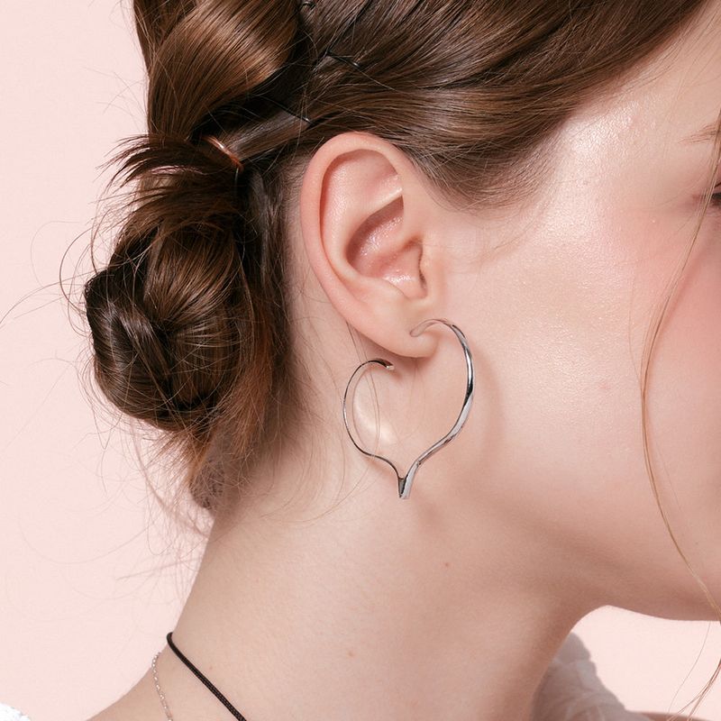 DANI（ダニ）の「Big Love Hoop Earrings（Accessories）」