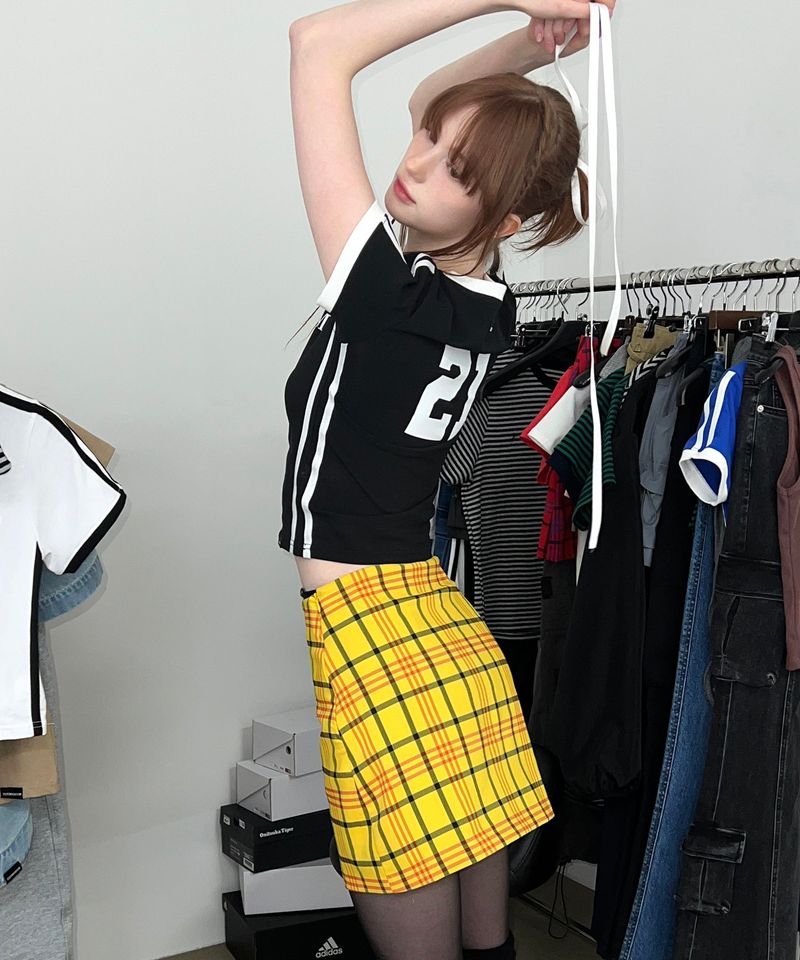 ZIZEMUSEUM（ジゼミュージアム）の「ORIGINAL MINI CHECK SKIRT (YELLOW)（Skirts）」