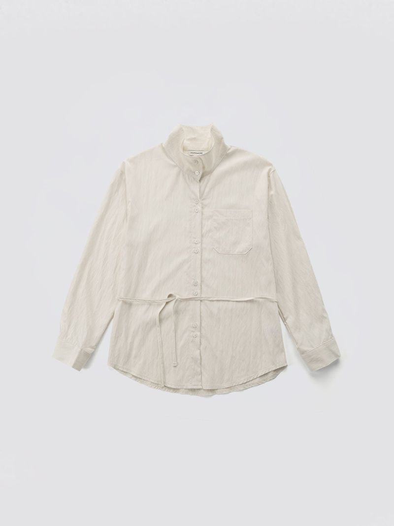 HOPESMORE（ホープスモア）の「Urban High-neck String Shirt_Ivory（Tops）」