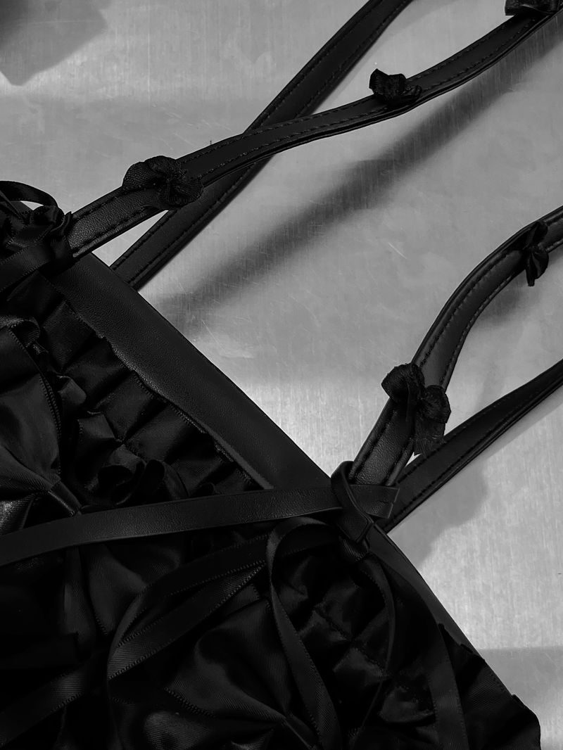 black leather ribbon bag