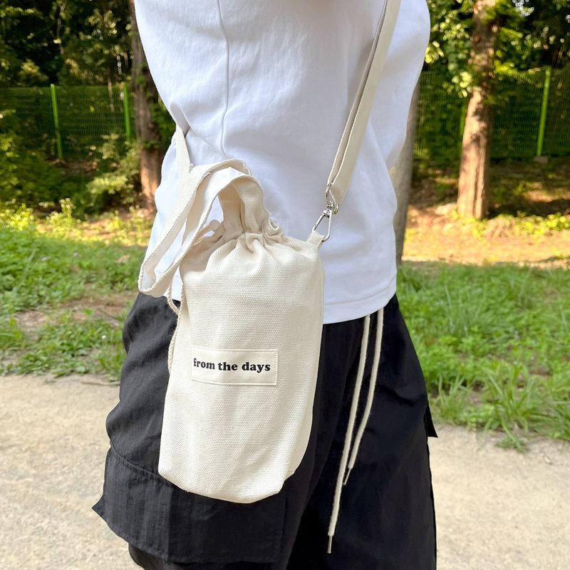 FROM THE DAYS（フロム ザ デイズ）の「【MADE】キャンバス防水タンブラークロスバッグ - ナチュラル（バッグ）」