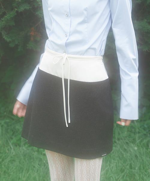 ZIZEMUSEUM（ジゼミュージアム）の「SATIN MIX MINI SKIRT (YELLOW)（Skirts）」