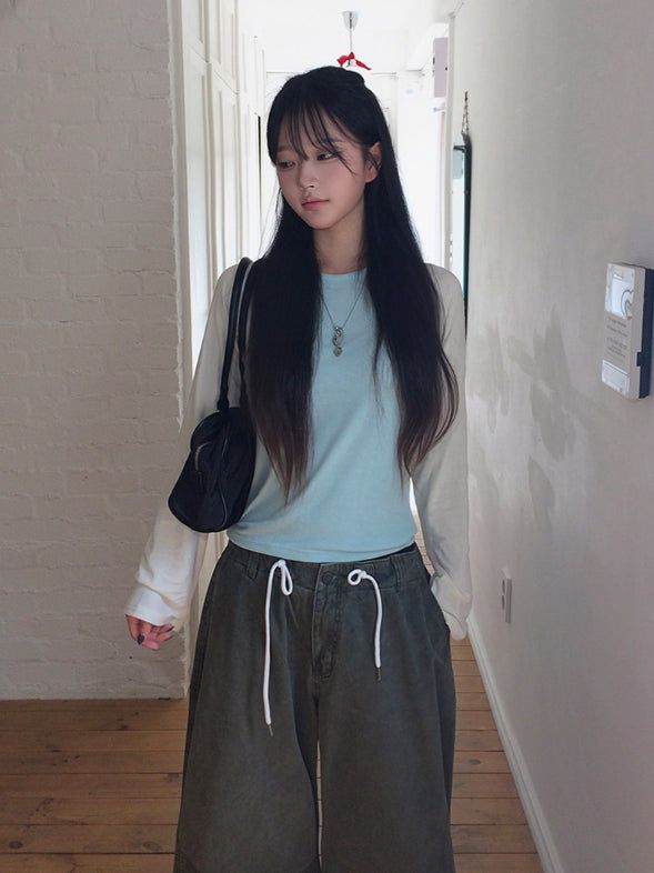 anyonemore（エニーワンモアー）の「サミ チェック ボタン ラグラン ロールアップ ロングスリーブ Tシャツ（トップス）」