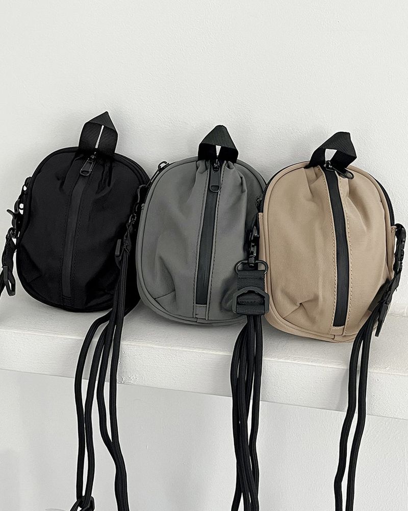 WONDER WONDER（ワンダーワンダー）の「Tiffin Zipper Mini Cross Bag（Bags）」