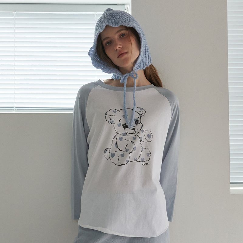 OVT-U（オーブイティーユー）の「Cozy Mellow Raglan Top_Blue（Tops）」