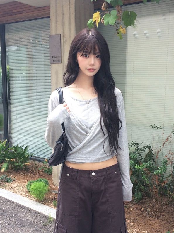 anyonemore（エニーワンモアー）の「Kiru Layered Wrap Cardigan（Tops）」