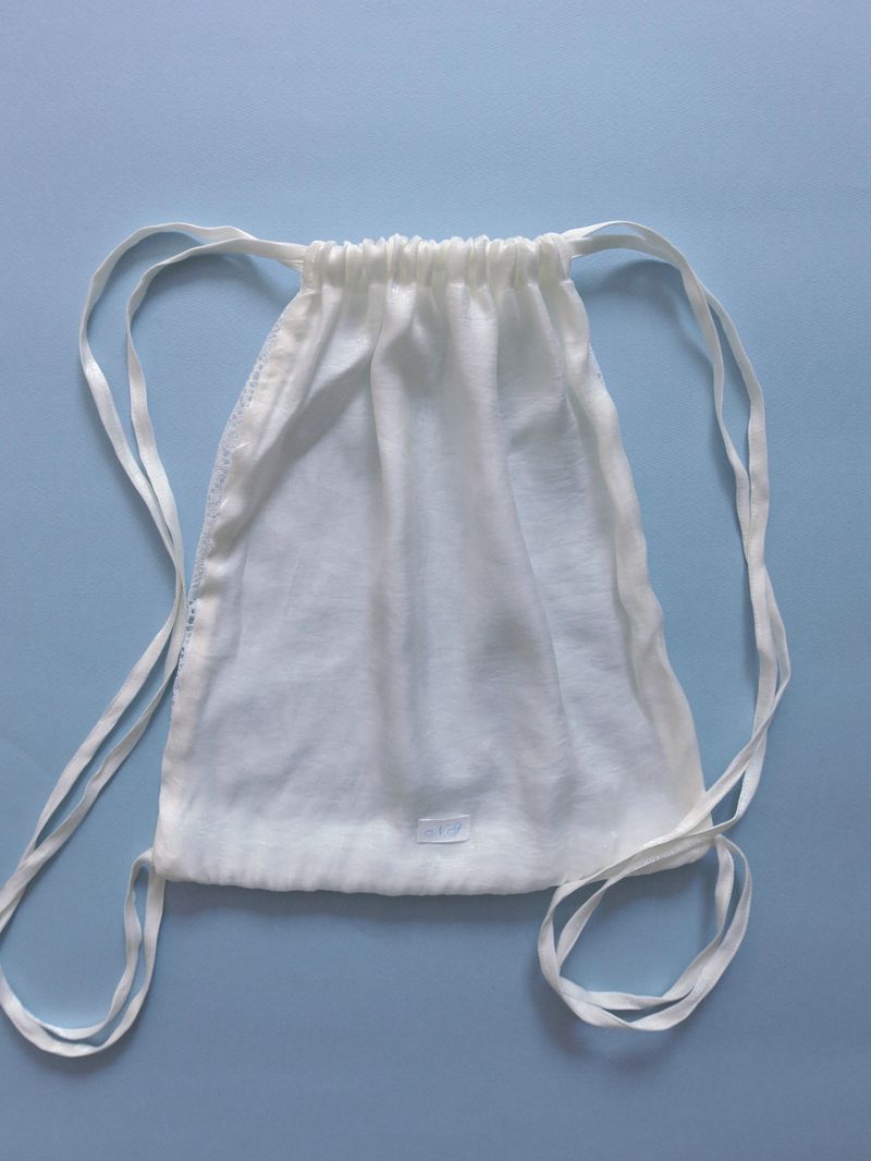 Paisley lace string bag