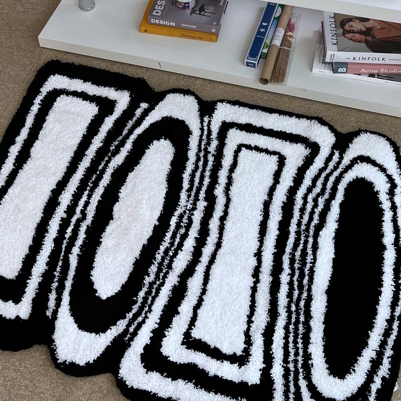 Black & white oval square tufting rug