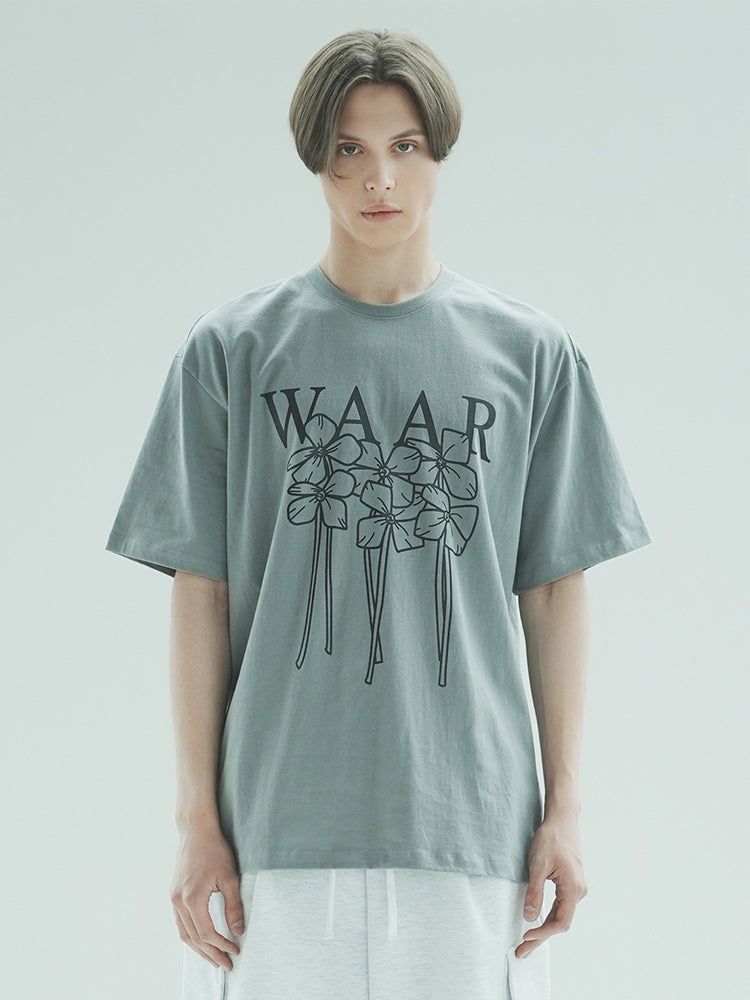 WAAR(ワル)の「T1012 M FLOWER T-SHIRT_CHARCOAL(Tops)」
