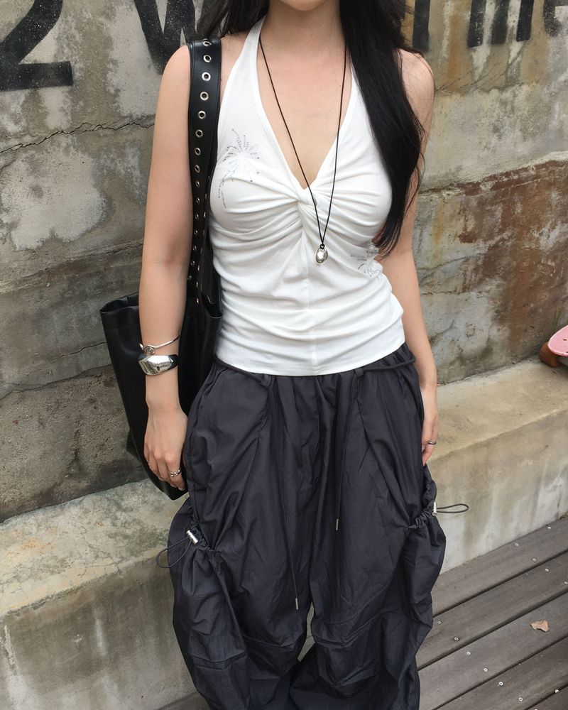 Cubic twisted sleeveless