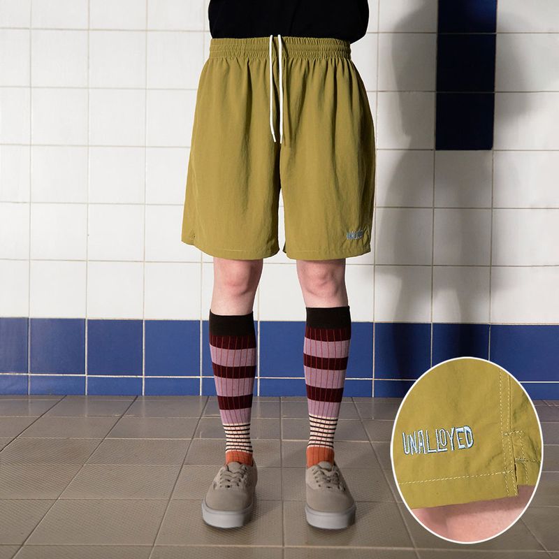 UNALLOYED(アナロイド)の「LOGO NYLON SHORT / OLIVE(Pants)」