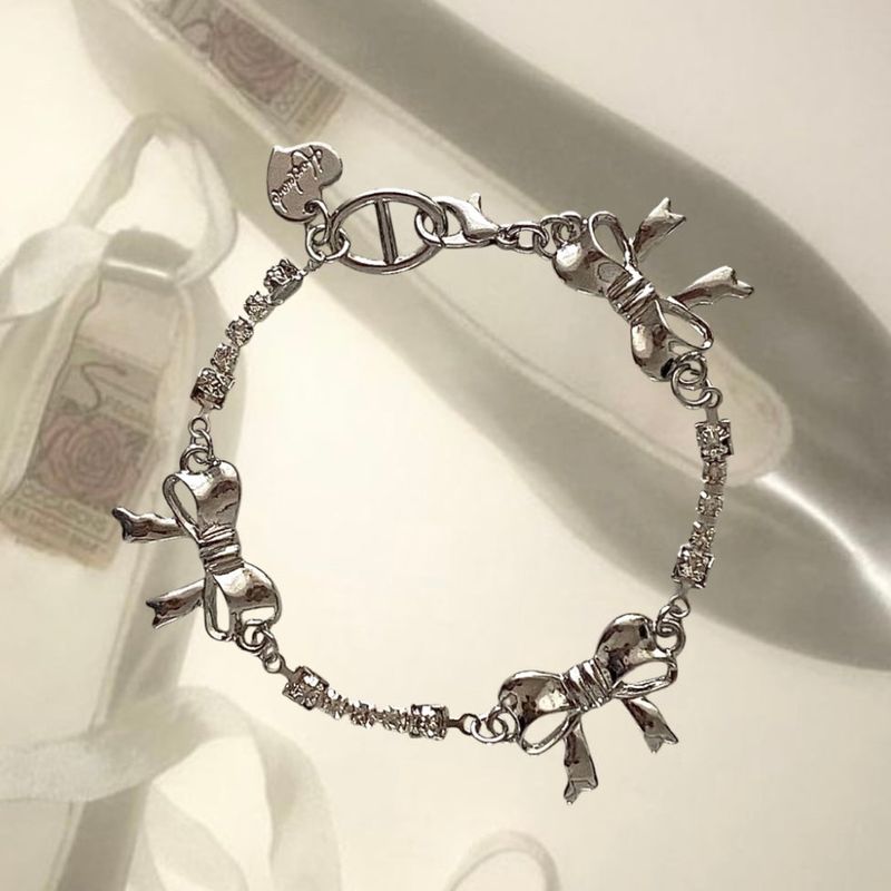 chouchou（シュシュ）の「bijou antique ribbon bracelet（Accessories）」