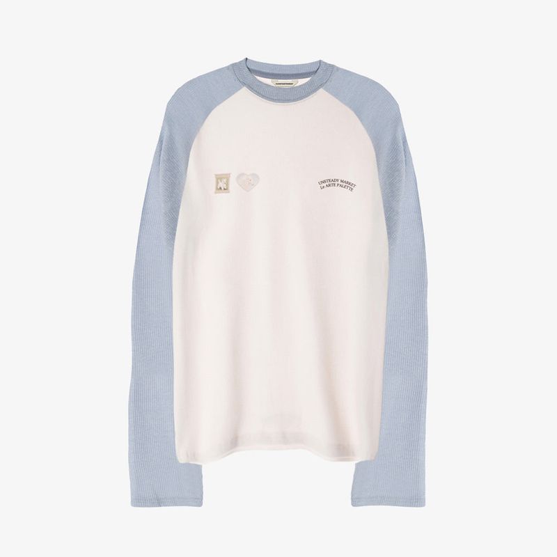 UNSTEADYMARKET（アンステディマーケット）の「ラグランワッフル長袖Tシャツ_ スカイブルー（トップス）」