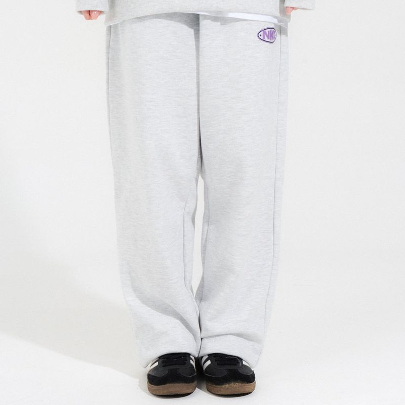 NEWKITSCH(ニューキッチジェネレーション)の「OVAL LOGO TRAINING PANTS-LIGHT MELANGE(Pants)」