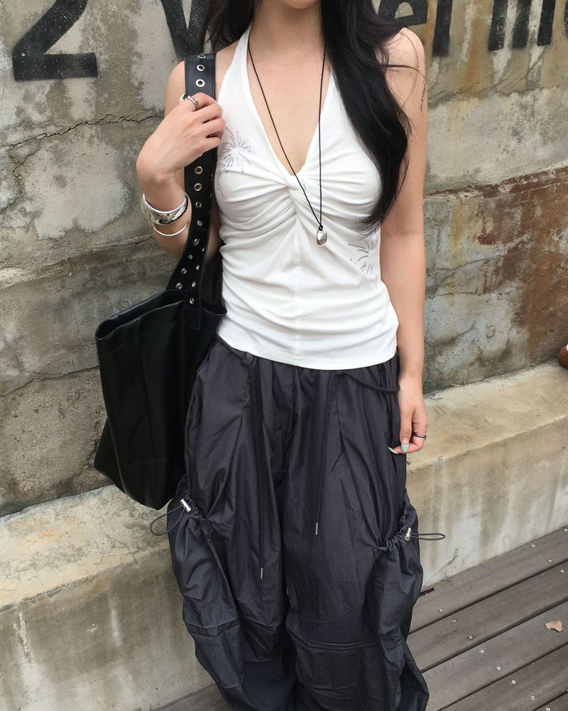 Cubic twisted sleeveless