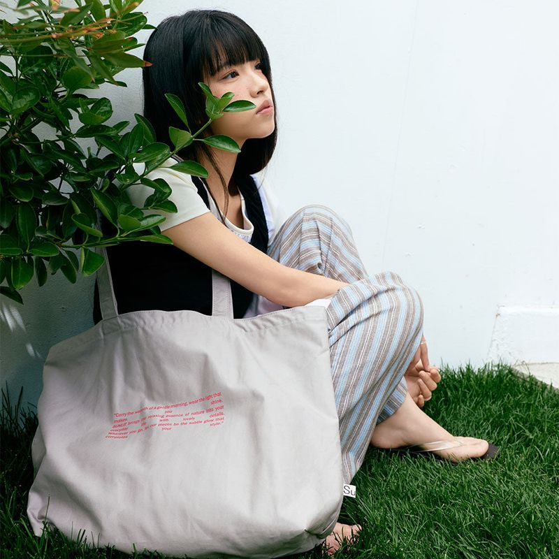 Sunlit（サンリット）の「Sunlit Lettering Eco Bag (Milk Tea)（Bags）」