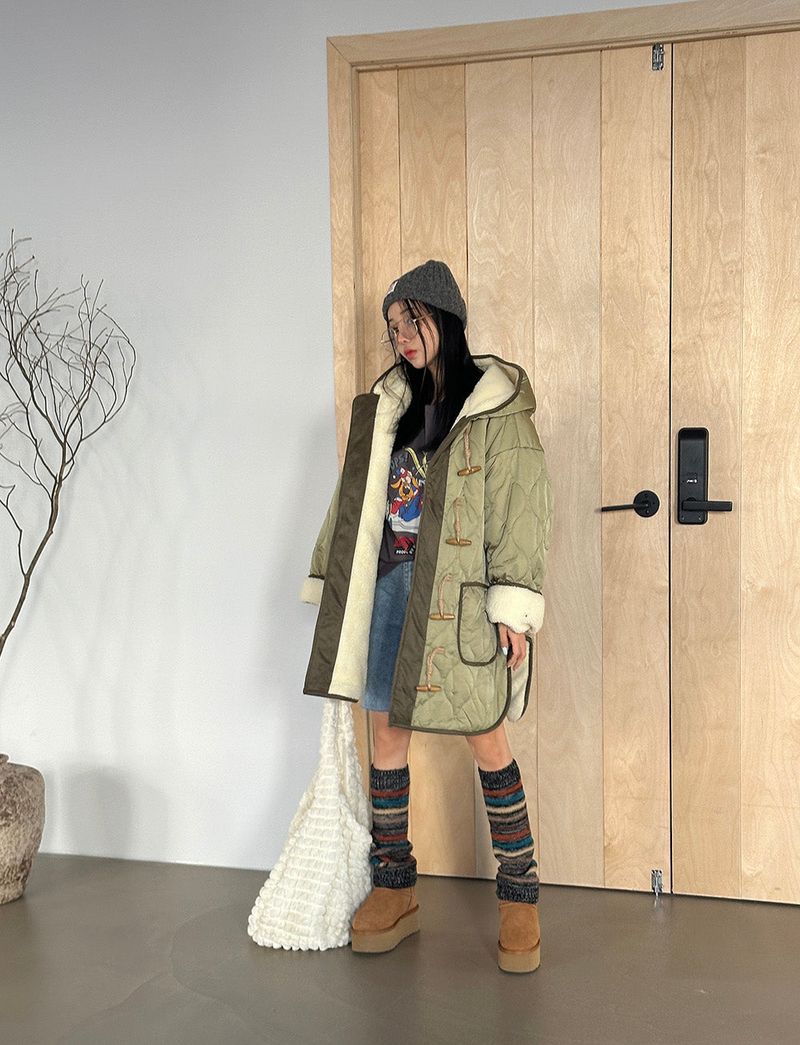 a quilted padded jacket with wool