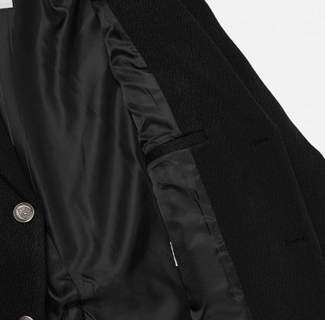 Crying medal over blazer