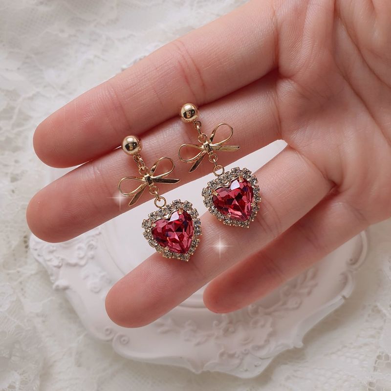 aimelbie（アイメルビー）の「ローズピンクハートアンドリボンイヤリング（アクセサリー）」