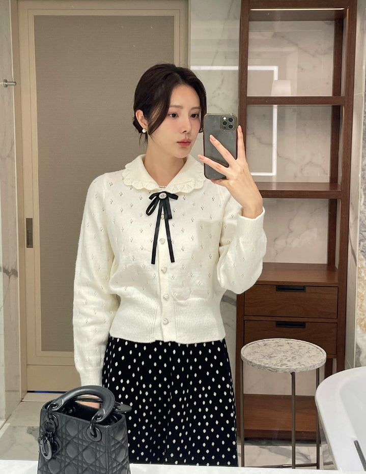 iam mari（アイアム マリ）の「Reju Punching Collar Heart Button Knit Cardigan (Brooch Set)（Tops）」