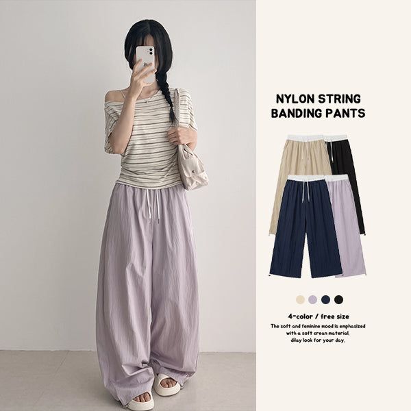 hijjoo（ハイチュー）の「ラベンダー 💜 ウエスト カラーコントラスト ナイロン スラックス ワイド パンツ (4 colors) #CrinklePants（パンツ）」
