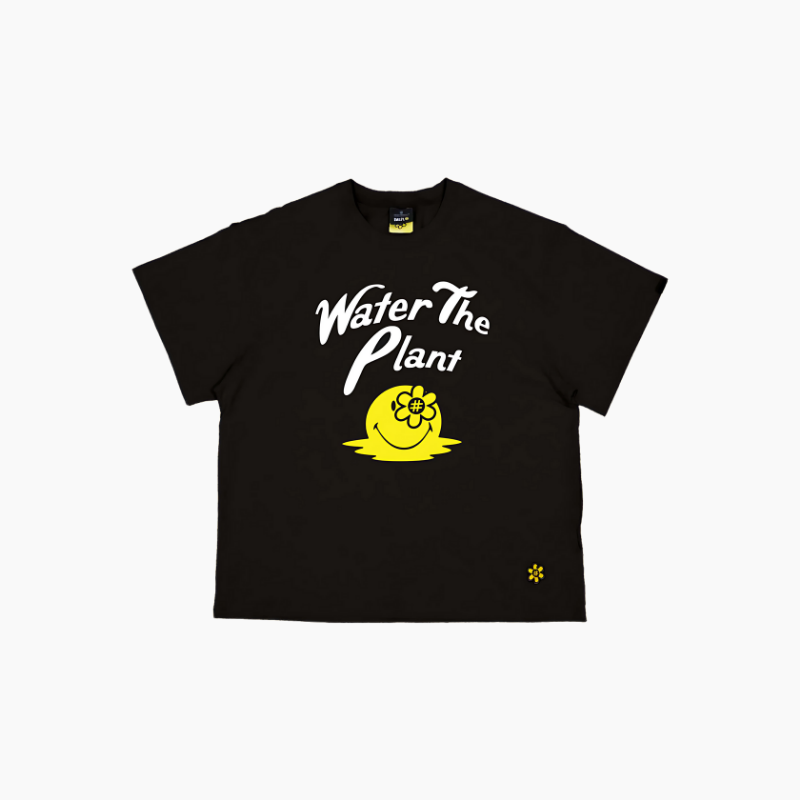 Water The Plant（ウォーターザプラント）の「MELTING SMILEYWORLD® TSHIRT | BLACK（Tops）」