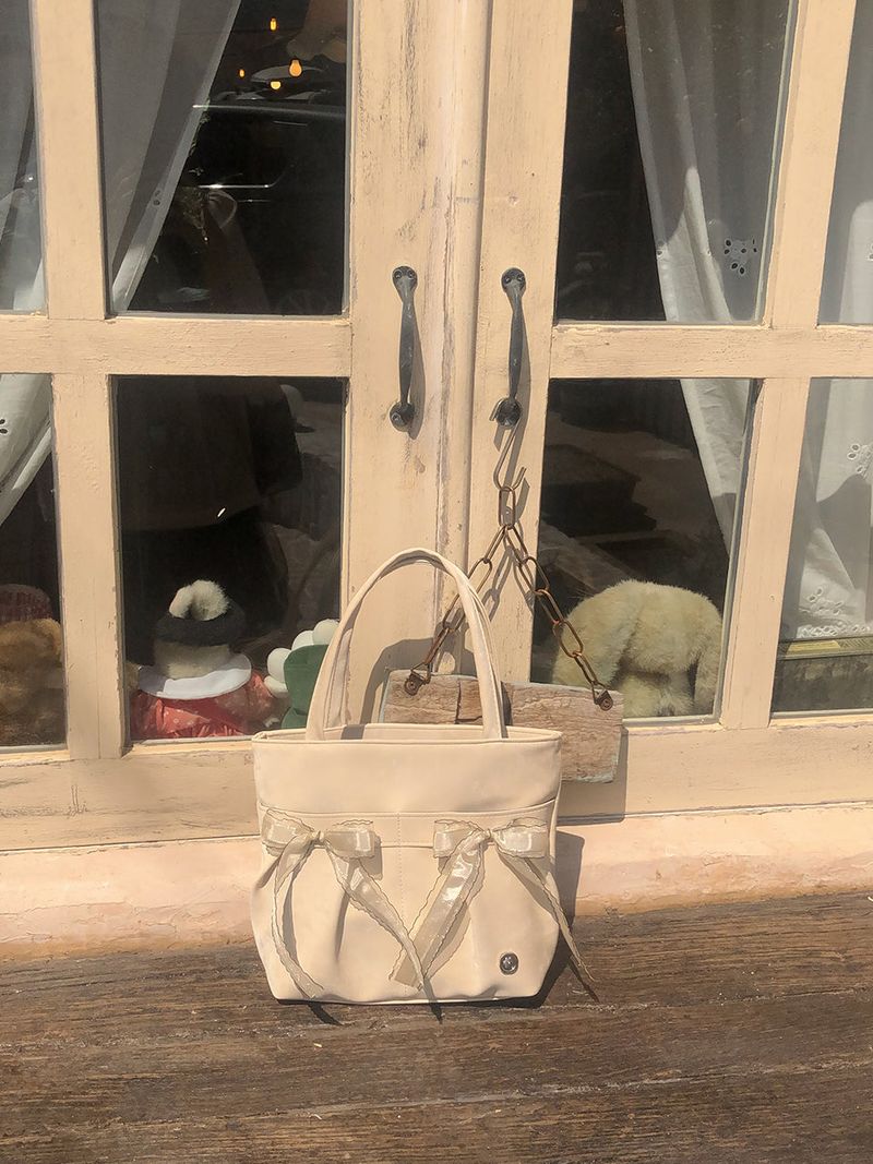 ovuni(オーブニ)の「Mini easy ribbon bag_sand beige(Bags)」