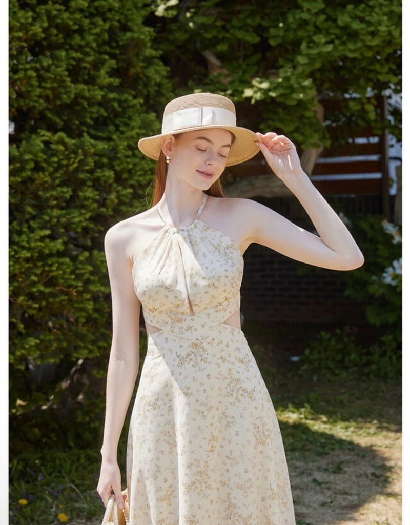 VALLO DE NERA（ベロディネラ）の「Dahlia Floral Halter Dress Yellow（Dresses）」