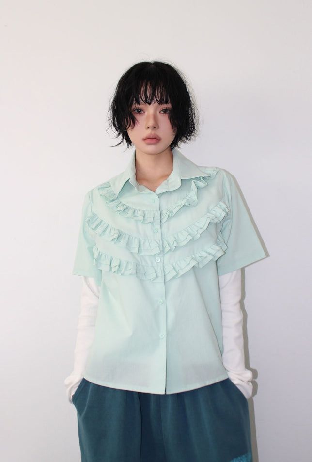 AAKE(アケ)の「FRILL LAYERED SHIRT(Tops)」